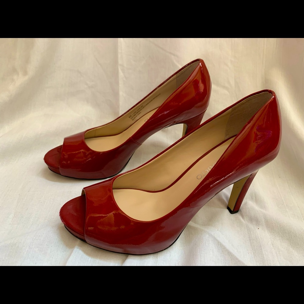 Red patent leather peep toe platform pumps